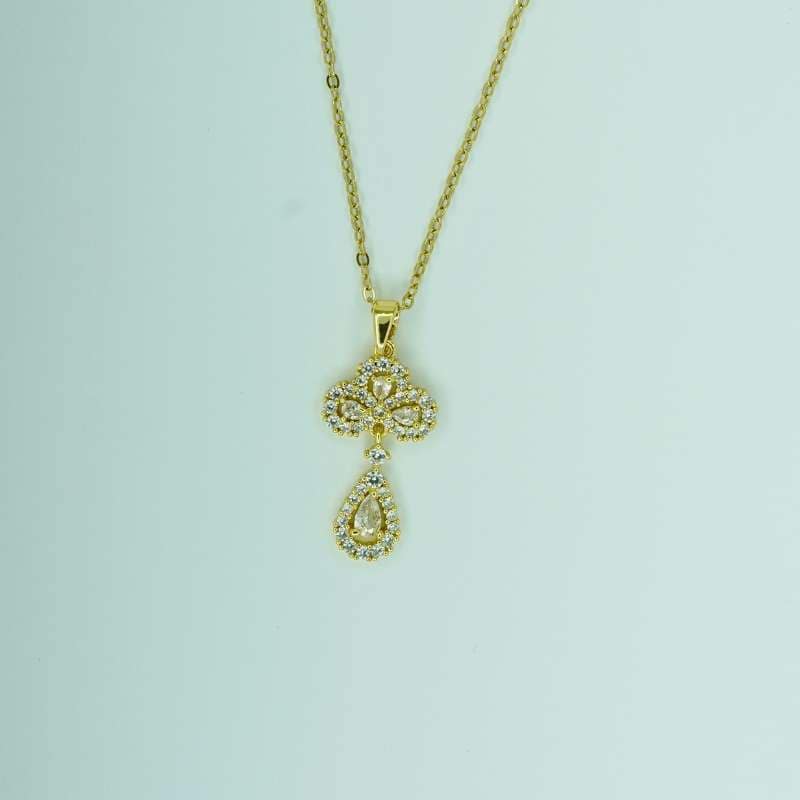 Gold Plated Zirconia Pendant Necklace 1 Embrace celestial beauty with our 18k Gold Plated Zirconia Pendant Necklace, featuring a captivating Crescent Moon & Star design. This exquisite necklace showcases sparkling zirconia stones set in a lustrous 18k gold plated finish, offering a perfect blend of elegance and charm. Ideal for adding a touch of sophistication to any outfit, this pendant necklace is a stunning accessory for both special occasions and everyday wear. Its unique design makes it a thoughtful gift for loved ones who appreciate the beauty of the night sky. Key Features: 18k gold plated finish Sparkling zirconia stones Unique Crescent Moon & Star design Perfect for special occasions or everyday wear Thoughtful gift for loved ones